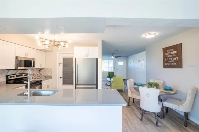 a view of a dining room with furniture