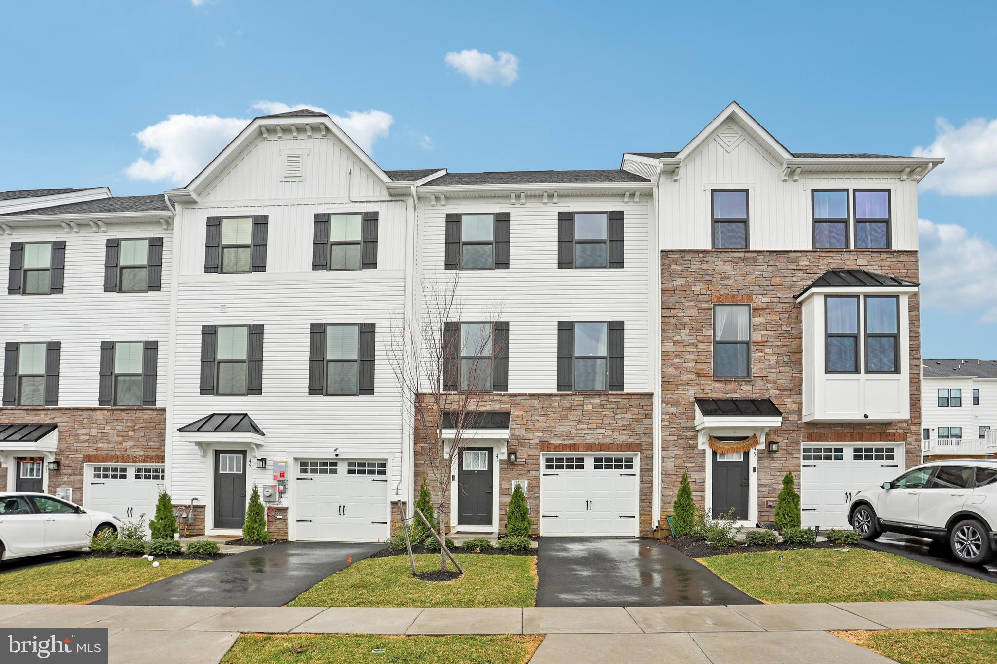 47 Rosemary Way Mount Laurel, NJ 08054 - Photo 1 of 47 a front view of a residential apartment building with a yard