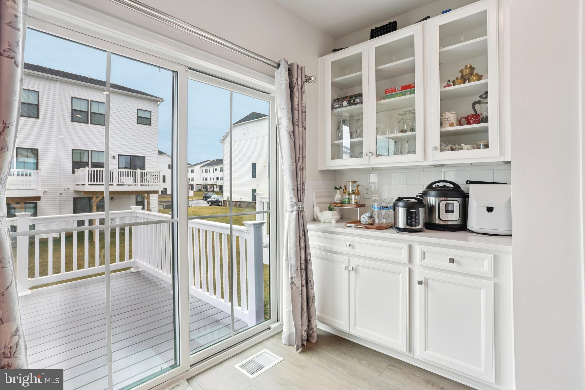 47 Rosemary Way Mount Laurel, NJ 08054 - Photo 11 of 47 a hallway with white cabinets and wooden floor