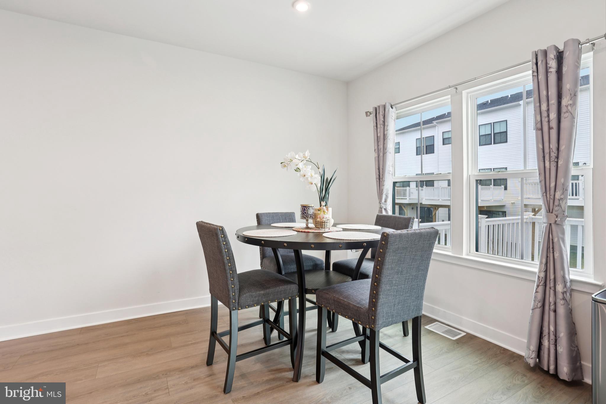47 Rosemary Way Mount Laurel, NJ 08054 - Photo 12 of 47 a view of a dining room with furniture window and wooden floor