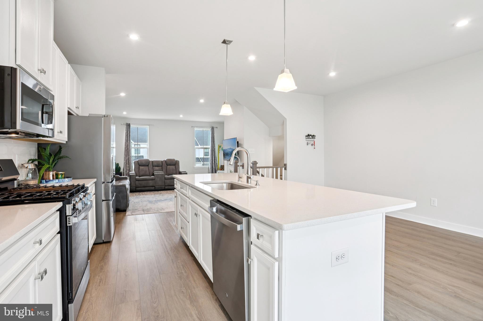 47 Rosemary Way Mount Laurel, NJ 08054 - Photo 16 of 47 a kitchen with stainless steel appliances kitchen island a sink stove and cabinets