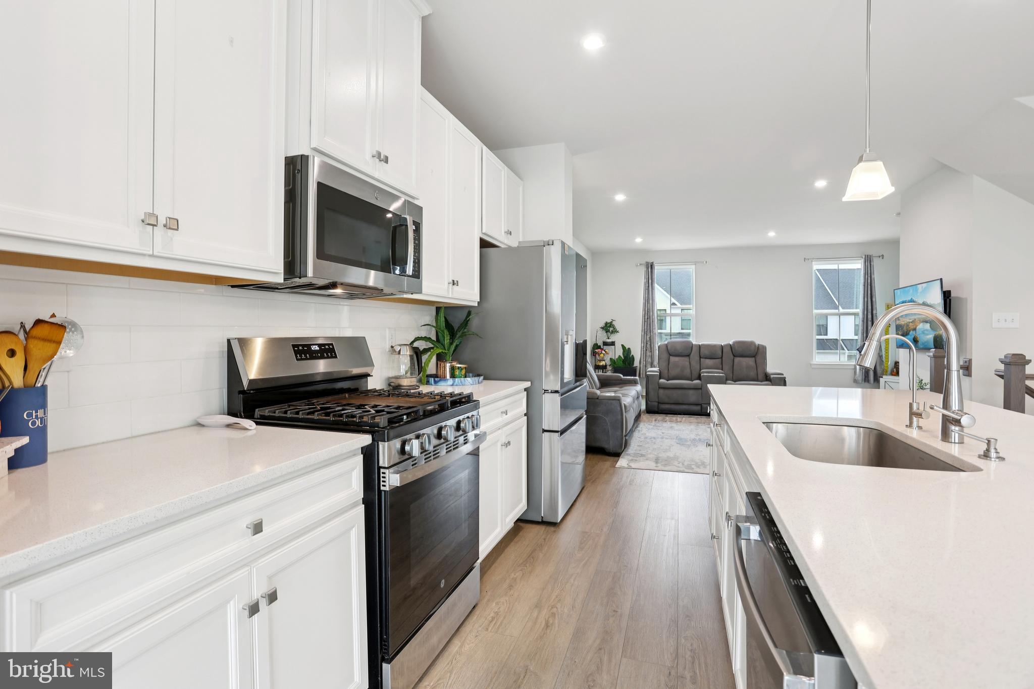 47 Rosemary Way Mount Laurel, NJ 08054 - Photo 17 of 47 a kitchen with stainless steel appliances a sink stove and microwave