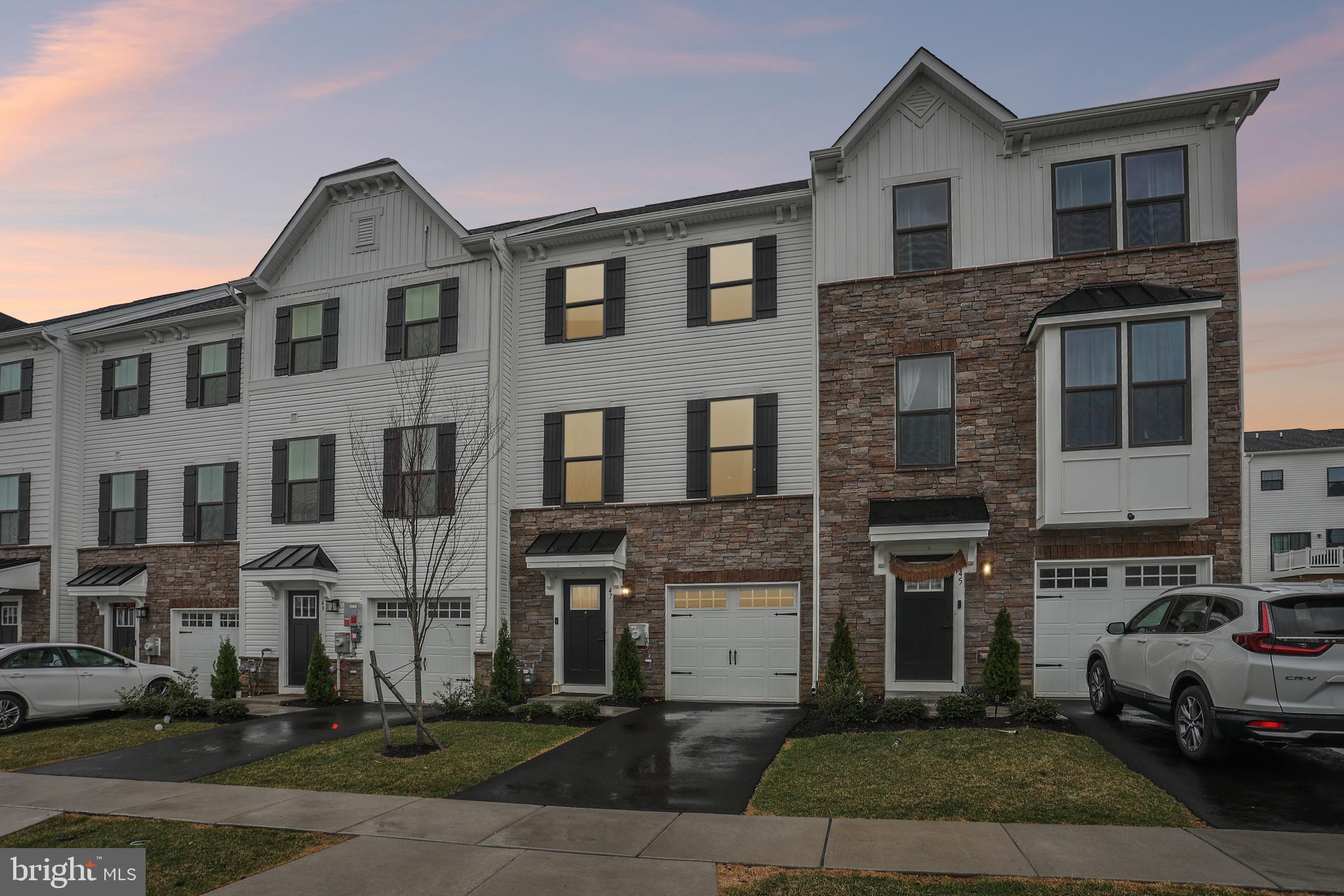 47 Rosemary Way Mount Laurel, NJ 08054 - Photo 2 of 47 a front view of a residential apartment building with a yard