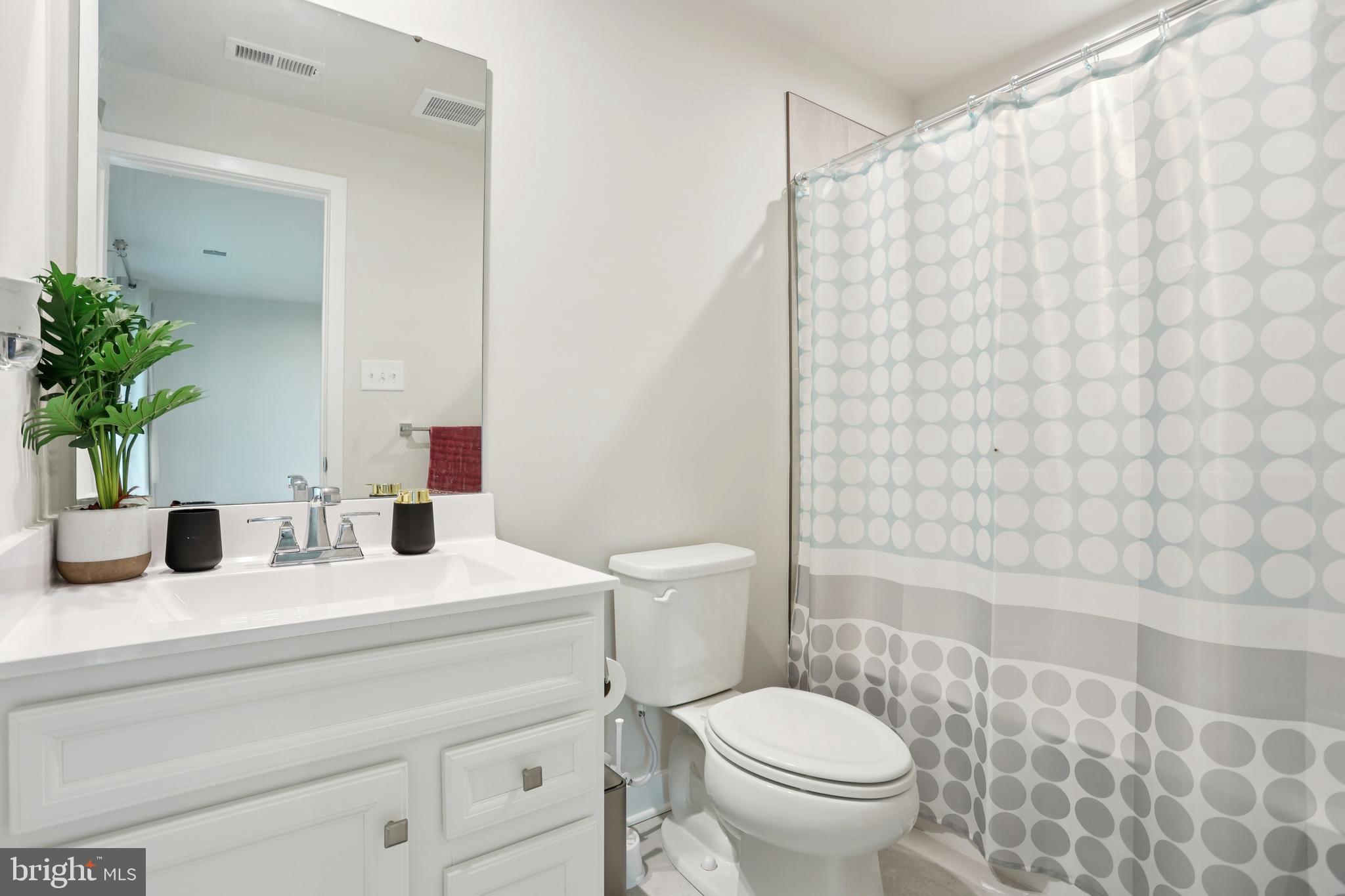 47 Rosemary Way Mount Laurel, NJ 08054 - Photo 21 of 47 a bathroom with a sink a toilet and shower