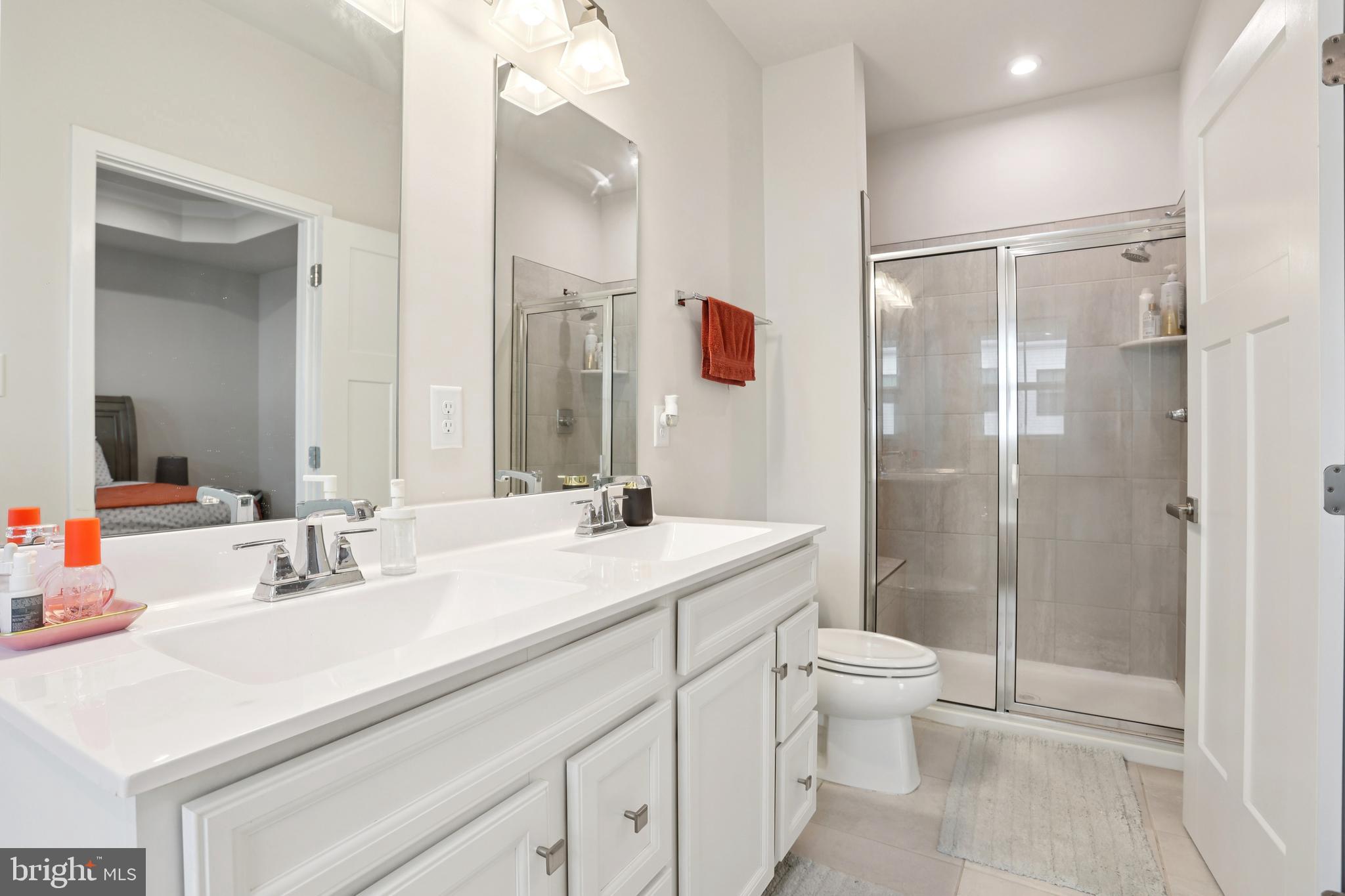 47 Rosemary Way Mount Laurel, NJ 08054 - Photo 33 of 47 a bathroom with a sink a toilet and shower