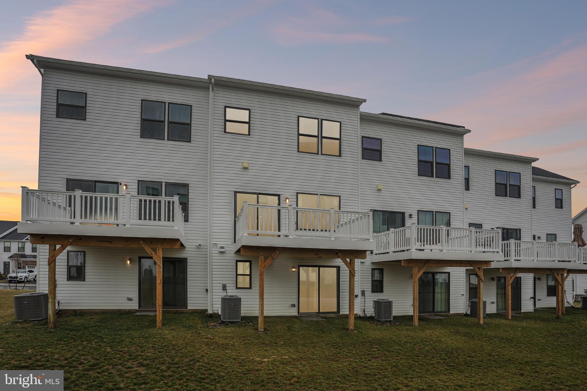 47 Rosemary Way Mount Laurel, NJ 08054 - Photo 43 of 47 a front view of a residential apartment building with a yard