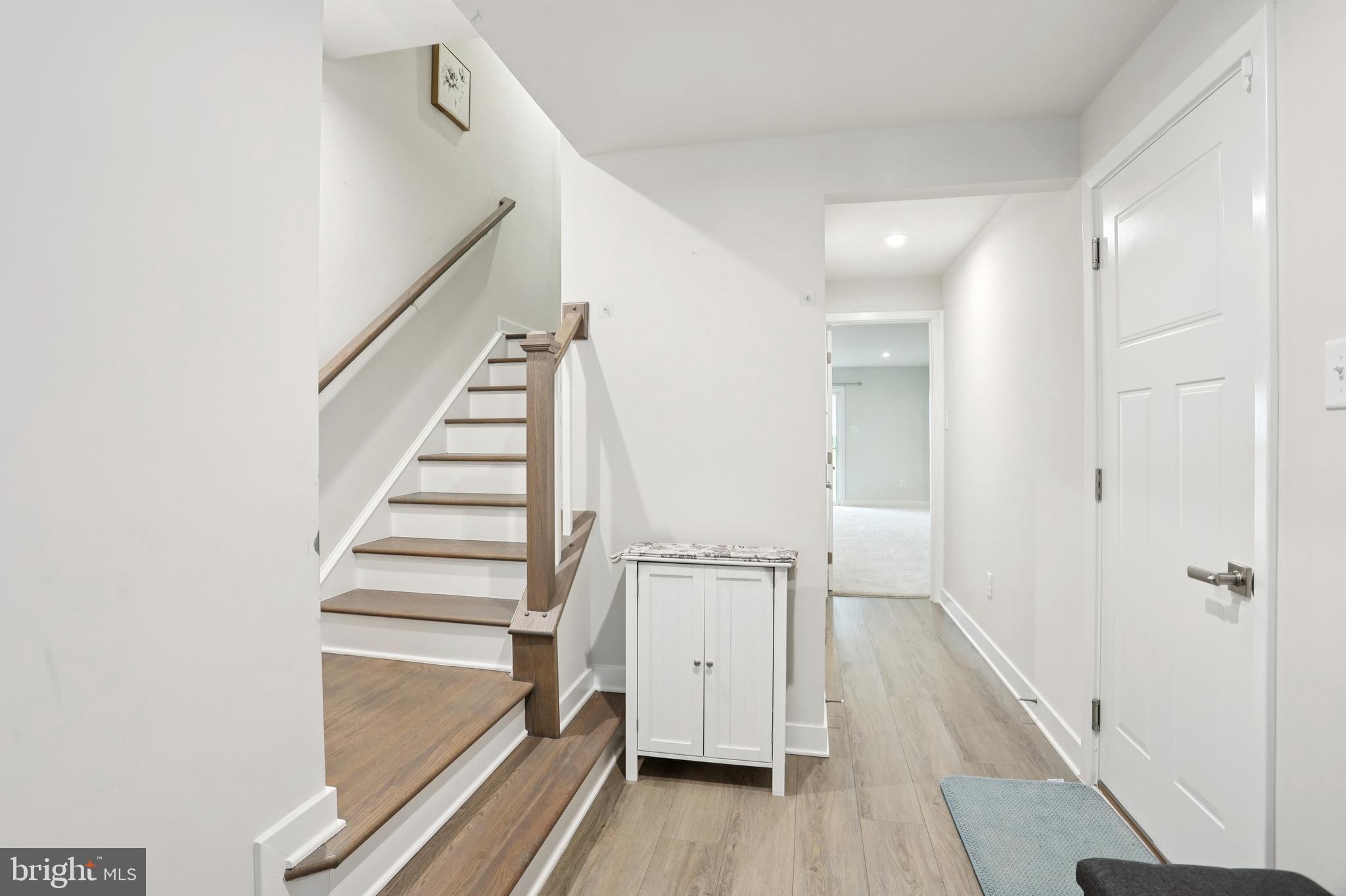 47 Rosemary Way Mount Laurel, NJ 08054 - Photo 6 of 47 a view of a hallway with wooden floor and staircase
