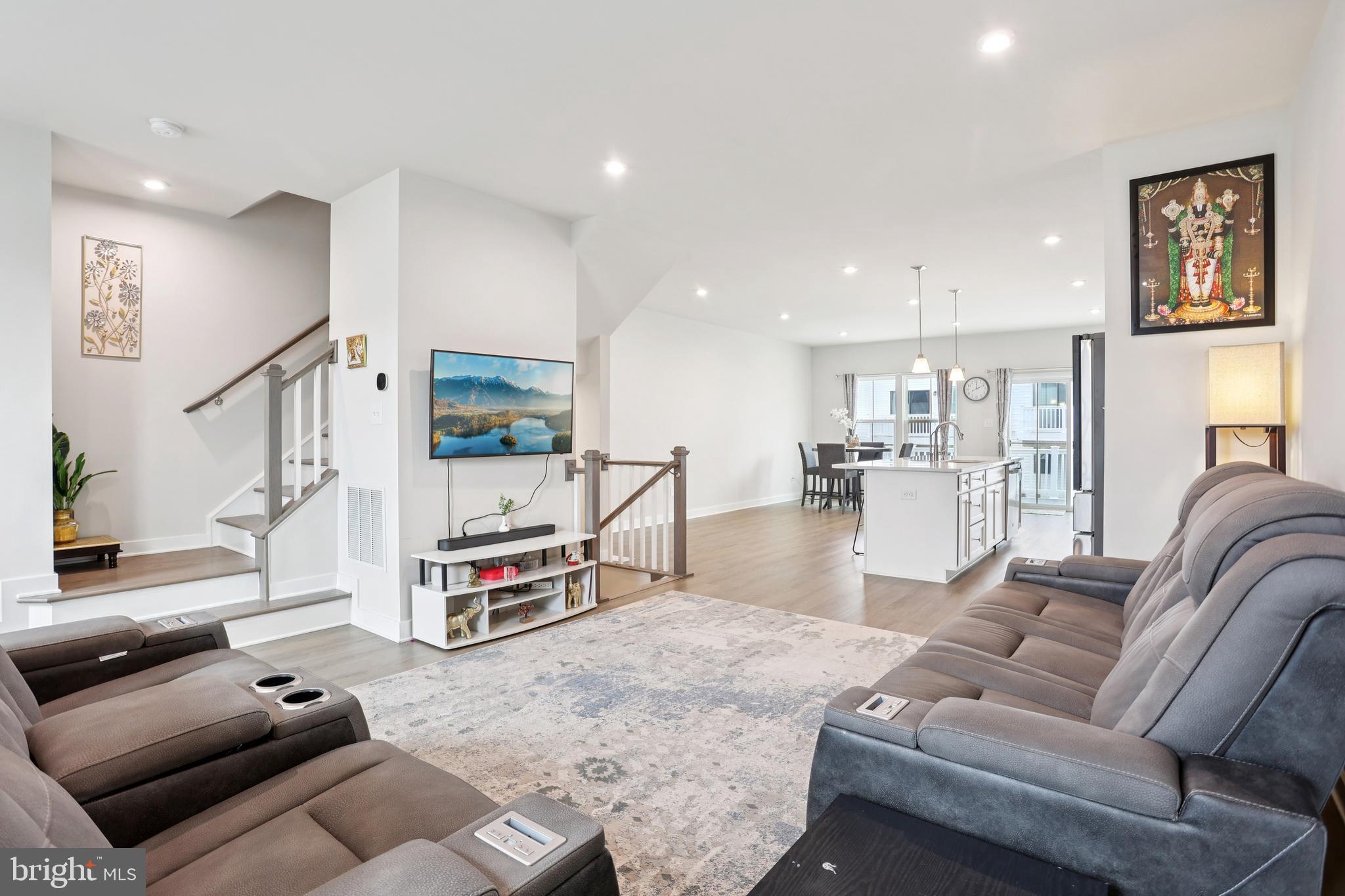47 Rosemary Way Mount Laurel, NJ 08054 - Photo 9 of 47 a living room with furniture and a flat screen tv
