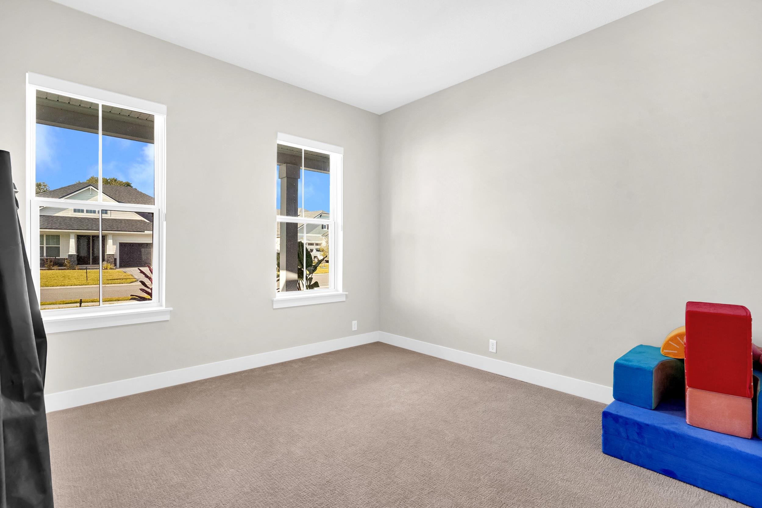 64 Oak Cluster Lane St. Augustine, FL 32092 - Photo 14 of 59 Spare room with baseboards and carpet