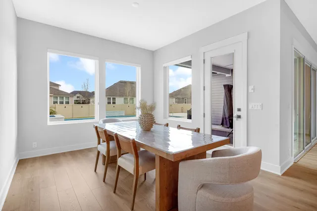 a livingroom with workspace and a couch