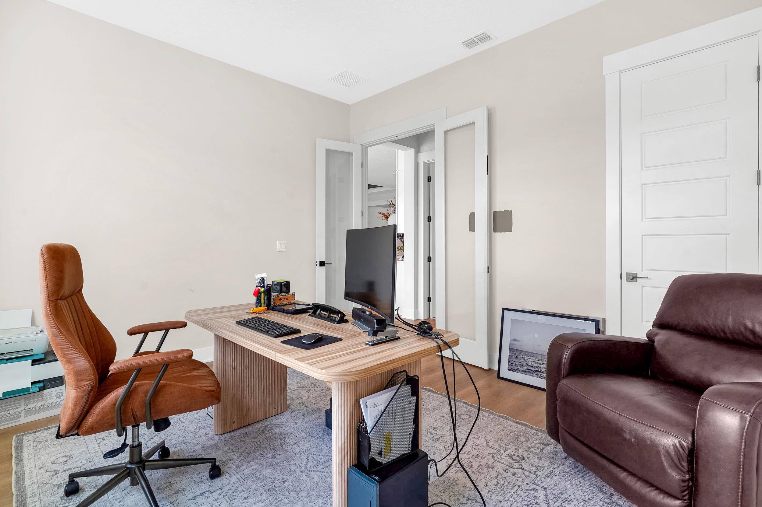 64 Oak Cluster Lane St. Augustine, FL 32092 - Photo 30 of 59 a livingroom with workspace and a couch