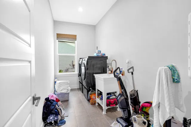 a bathroom with a tub and shower