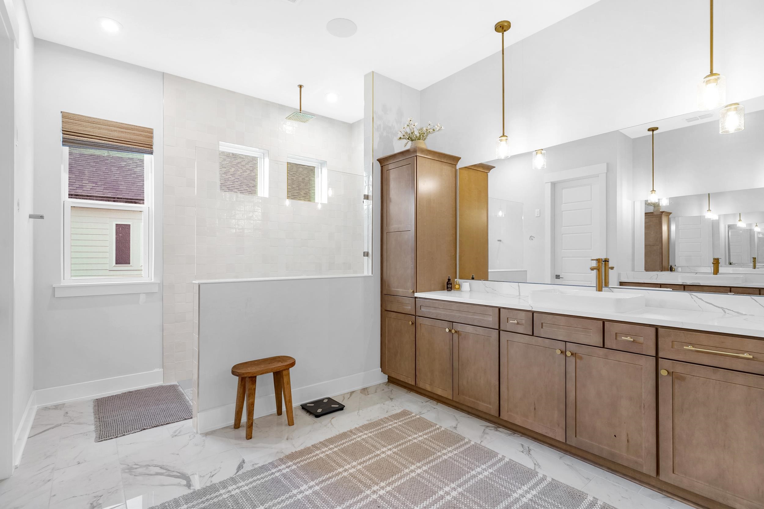 64 Oak Cluster Lane St. Augustine, FL 32092 - Photo 37 of 59 Full bath with vanity, light marble finish floors, and walk in shower