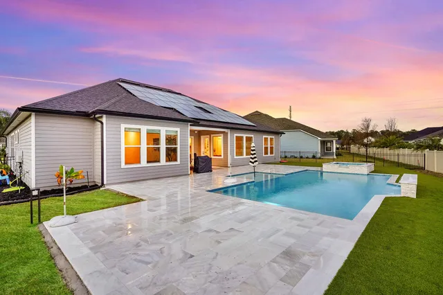 a view of a city with lawn chairs