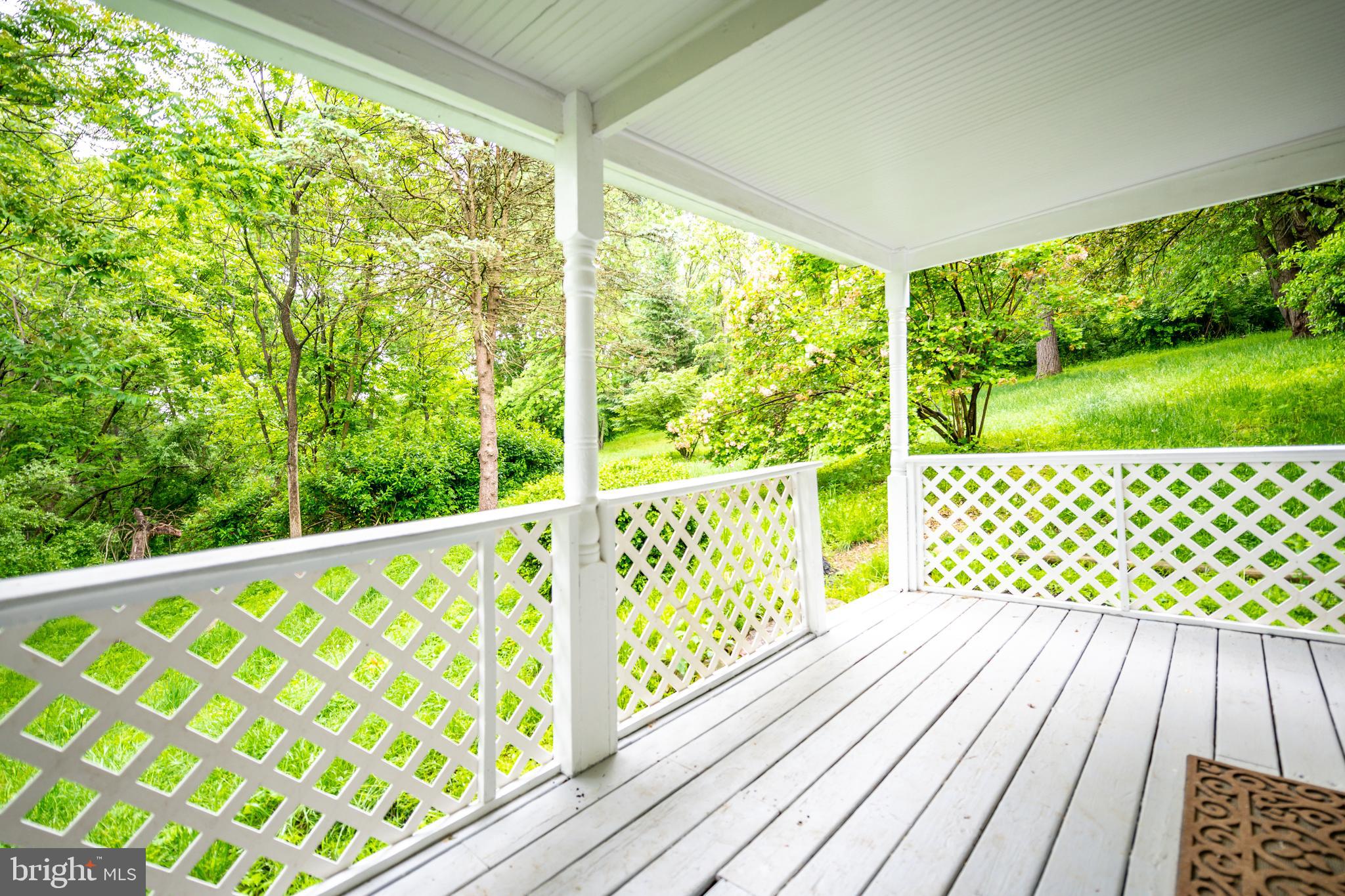 142 White Hall Road Winchester, VA 22603 - Photo 11 of 53 Porch off kitchen view towards backyard