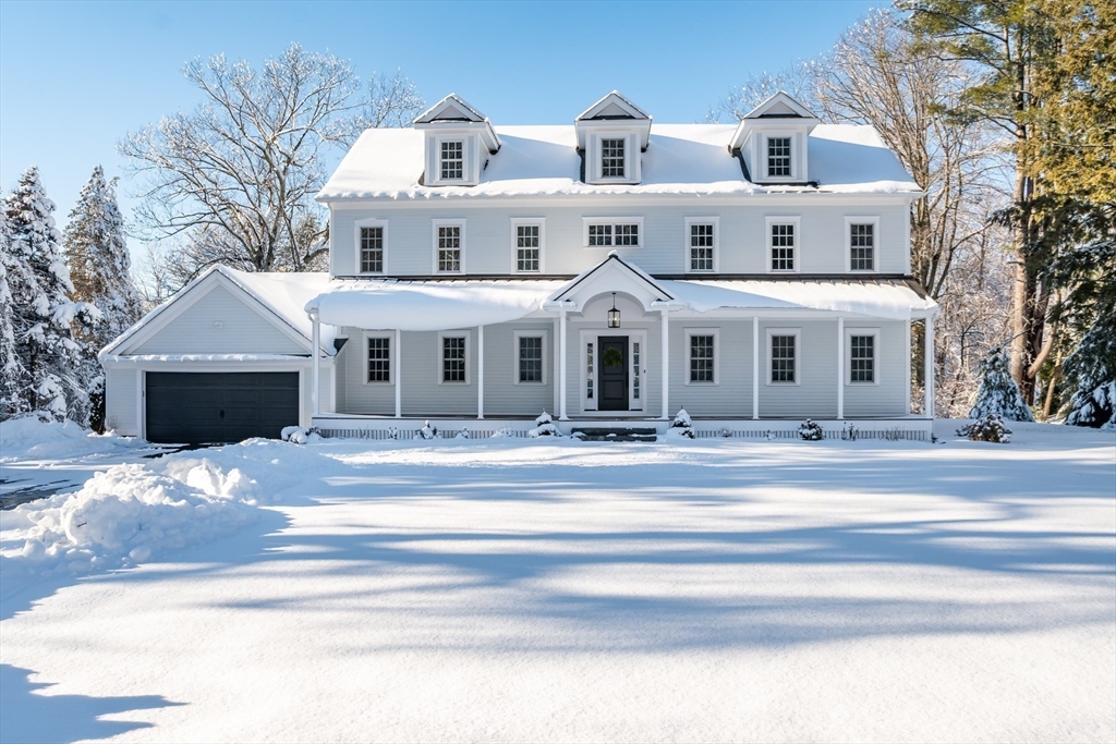 59 Shady Hill Road Weston, MA 02493 - Photo 1 of 1 a front view of a house with a yard