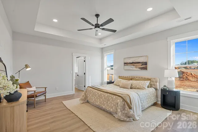 a bedroom with a bed and a table