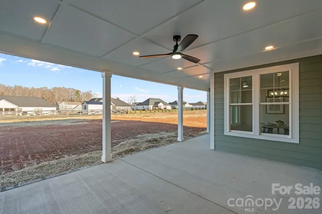a view of a large hall with a floor to ceiling window