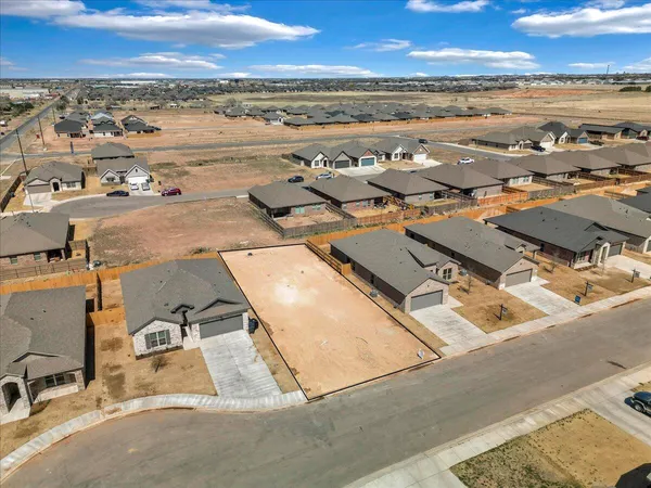 an aerial view of residential building with outdoor space