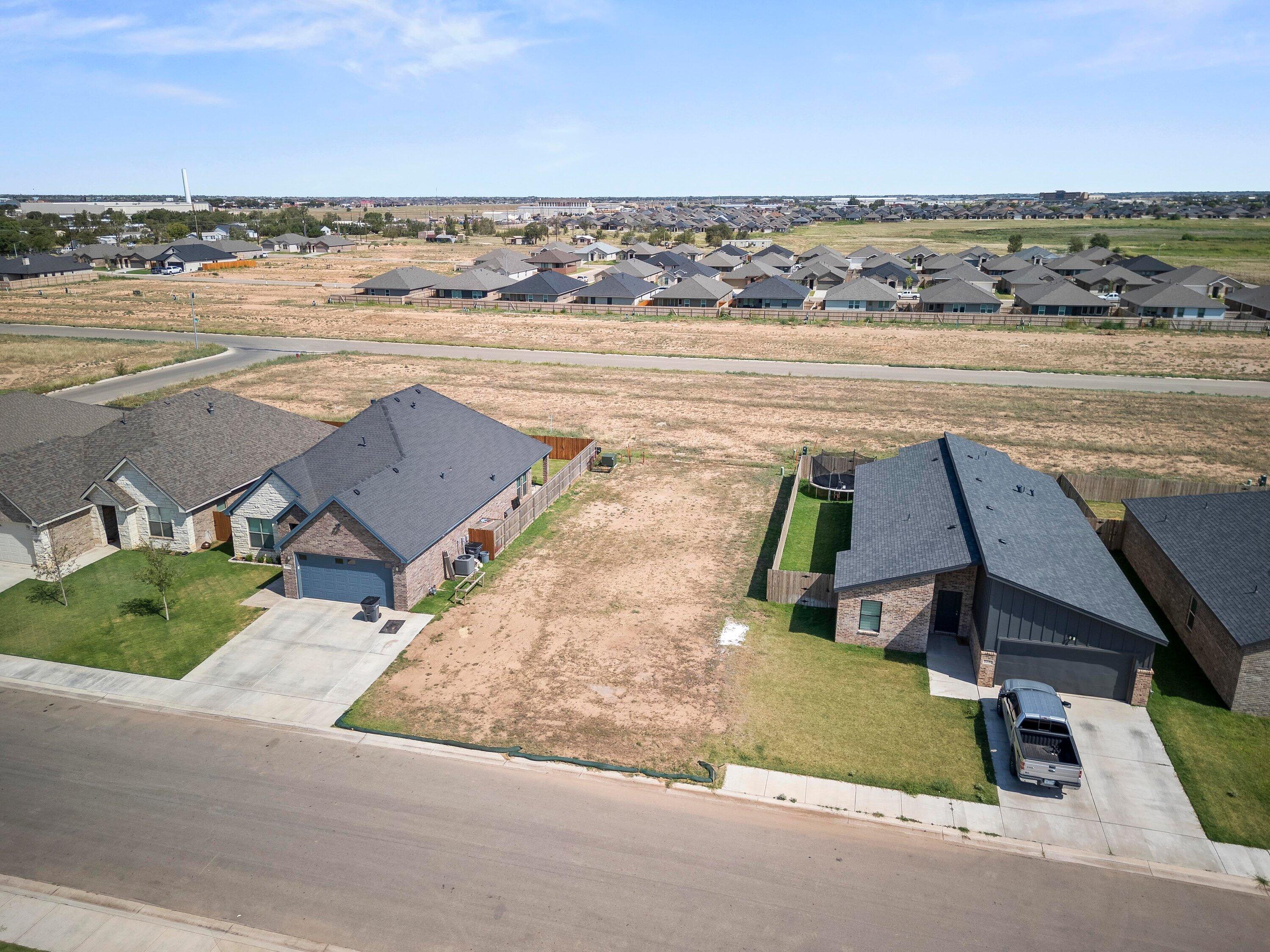 7815 95th Street Lubbock, TX 79424 - Photo 10 of 11 an aerial view of a ocean beach