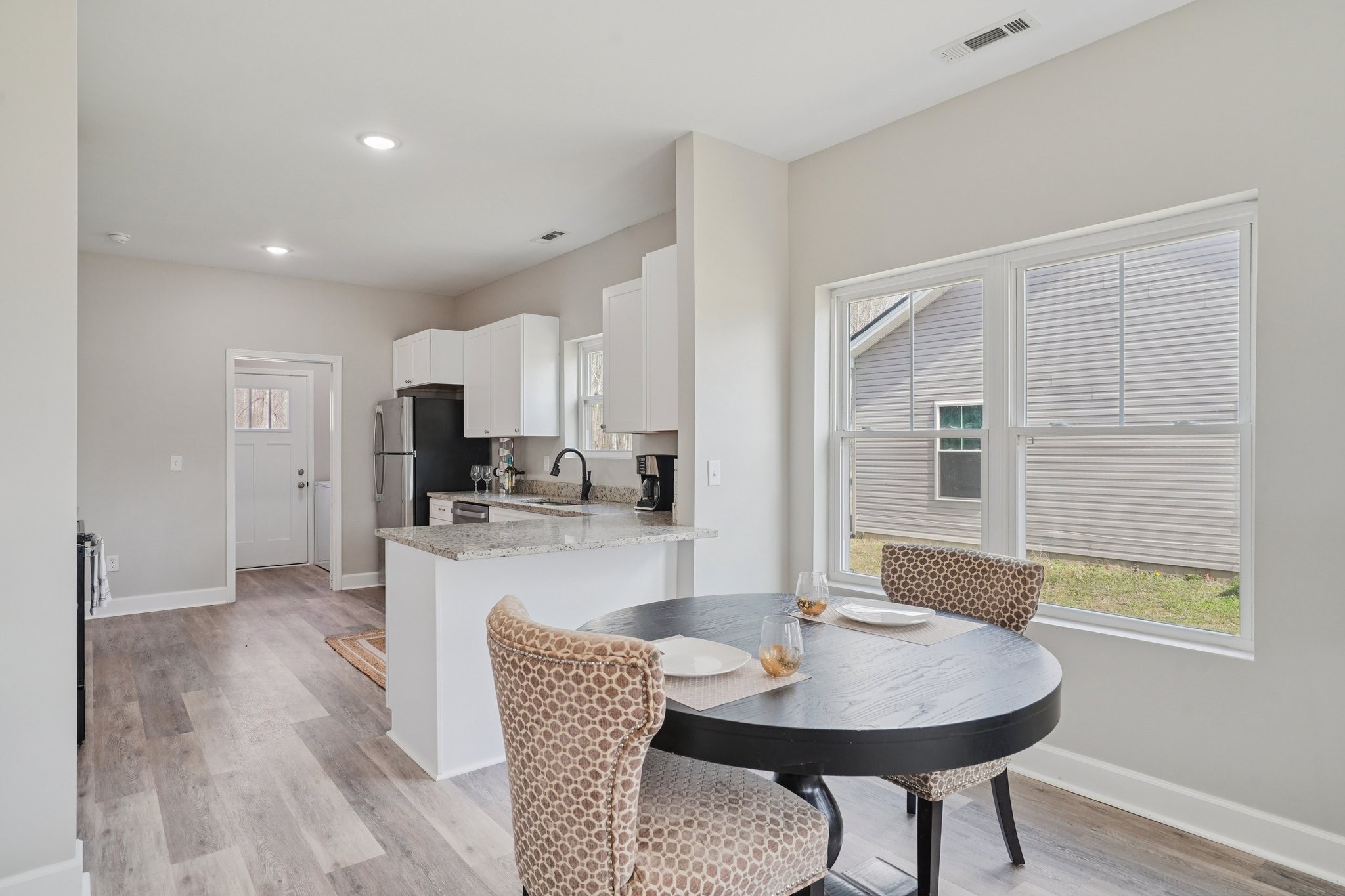 152 Eno Road Dickson, TN 37055 - Photo 12 of 35 a view of a dining room with furniture