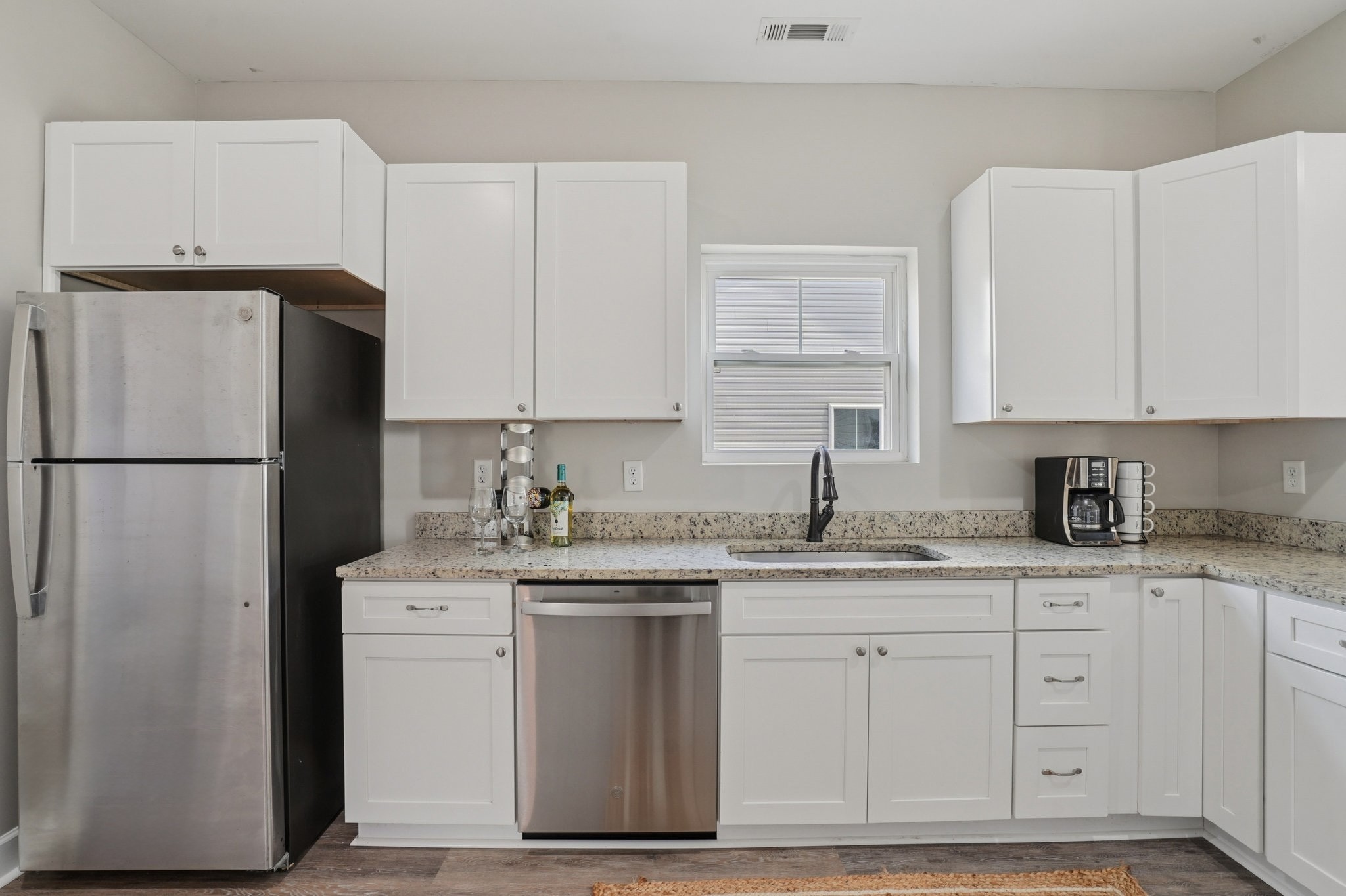152 Eno Road Dickson, TN 37055 - Photo 15 of 35 a kitchen with appliances a sink and a refrigerator