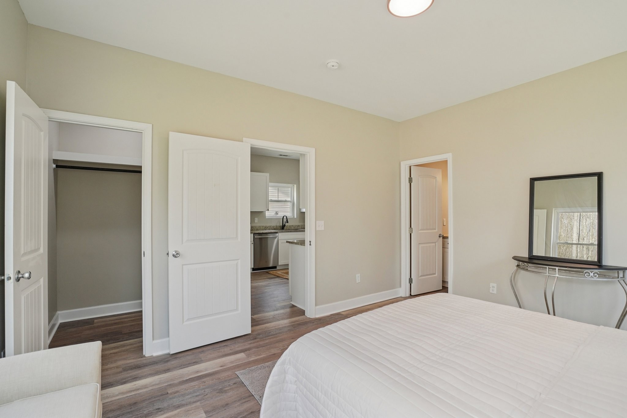 152 Eno Road Dickson, TN 37055 - Photo 18 of 35 a bedroom with a bed and wooden floor