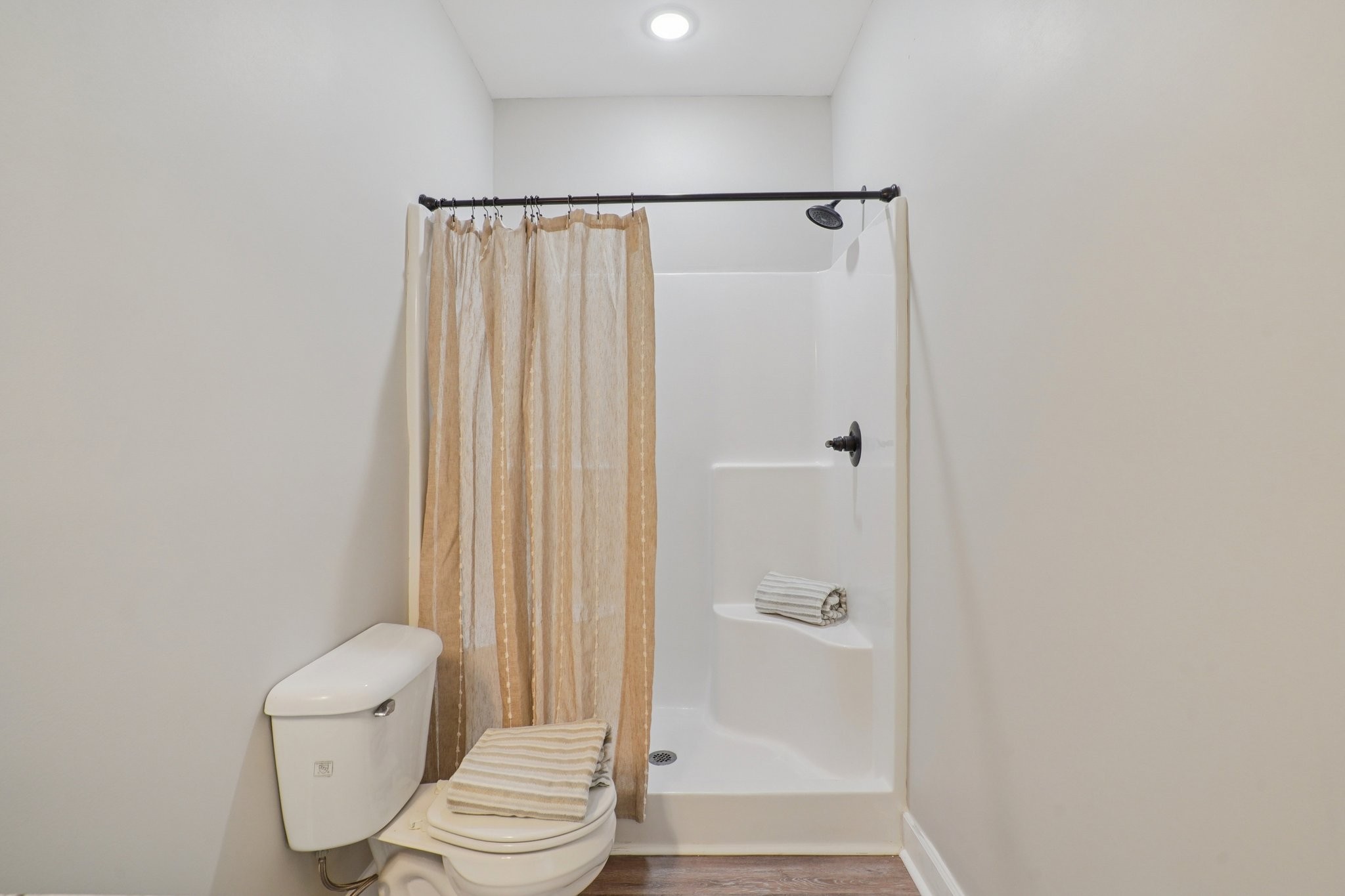 152 Eno Road Dickson, TN 37055 - Photo 20 of 35 a bathroom with a toilet and a shower