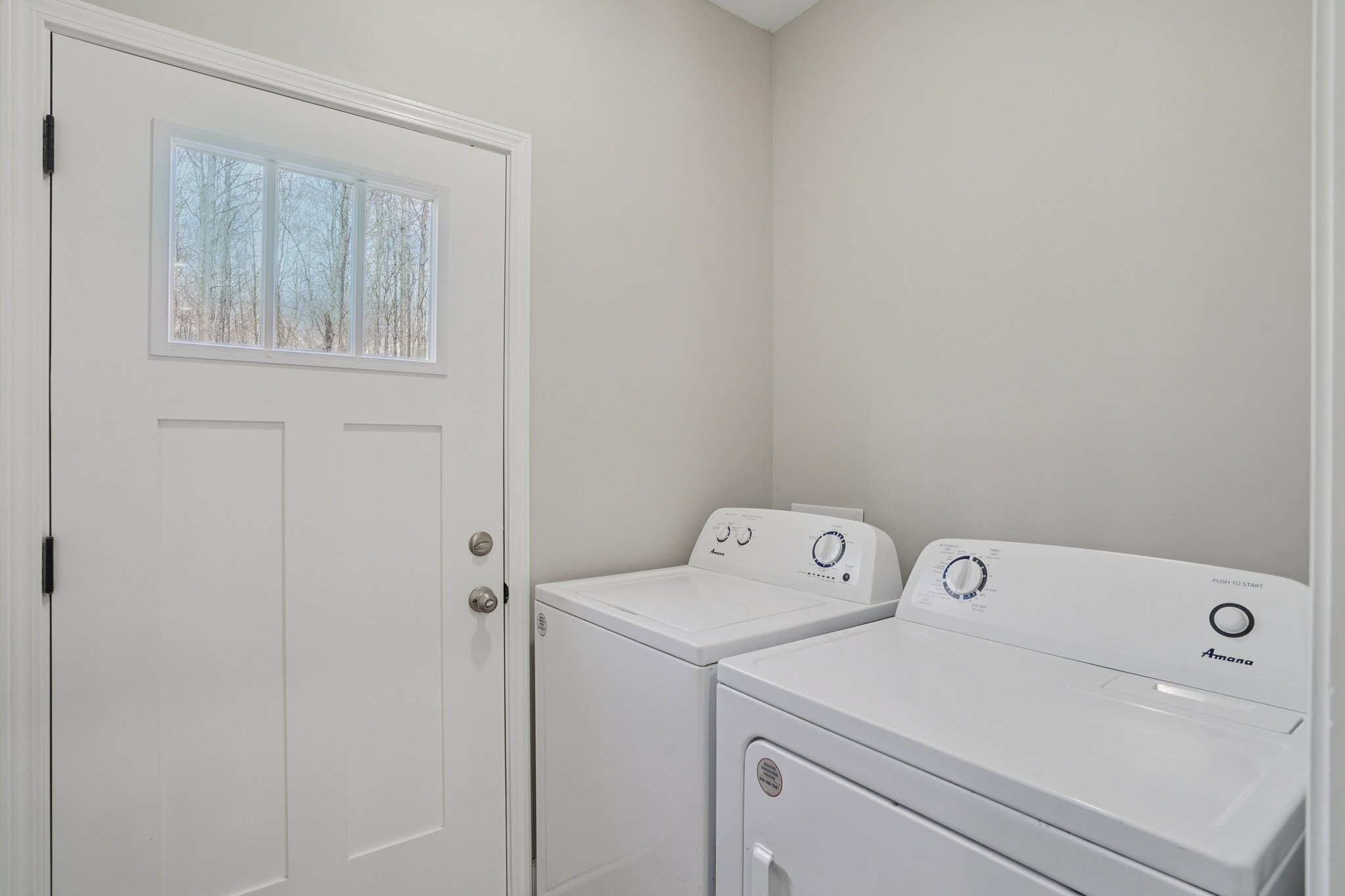 152 Eno Road Dickson, TN 37055 - Photo 27 of 35 a utility room with dryer and washer