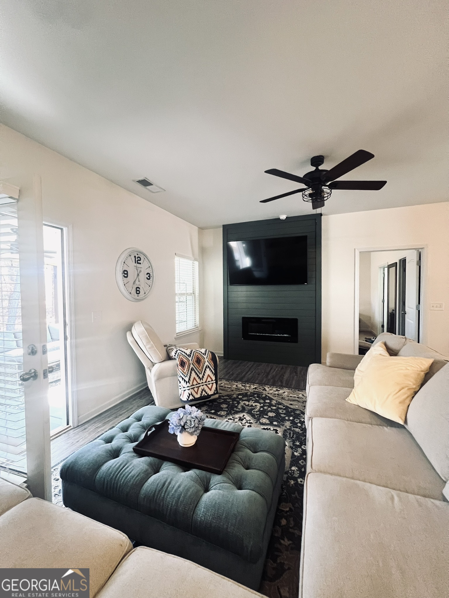 78 Willowrun Drive Rome, GA 30165 - Photo 12 of 35 a living room with furniture and a flat screen tv