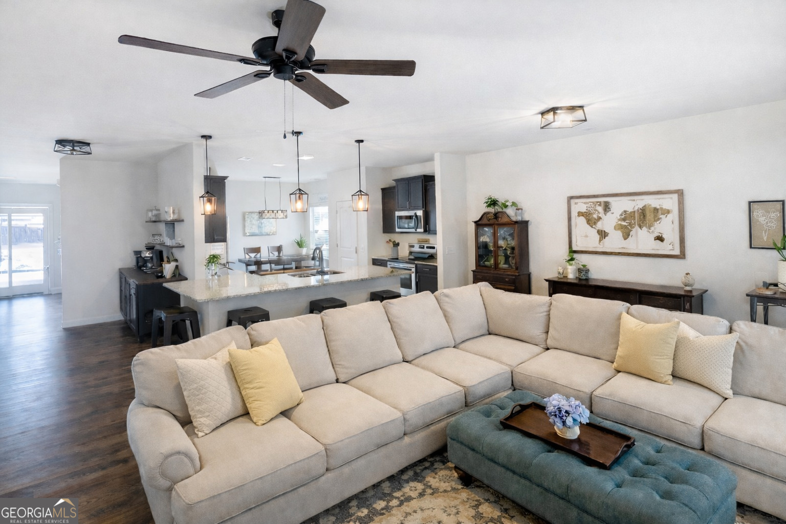 78 Willowrun Drive Rome, GA 30165 - Photo 13 of 35 a living room with furniture kitchen view and a chandelier