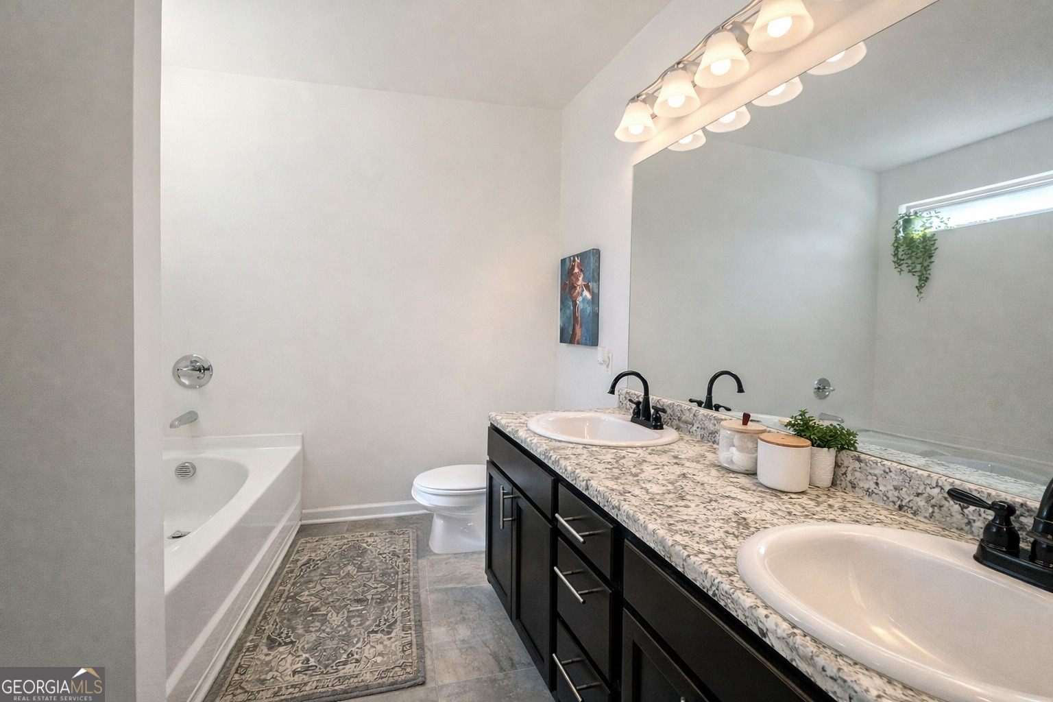 78 Willowrun Drive Rome, GA 30165 - Photo 19 of 35 a bathroom with a granite countertop sink a toilet and bathtub