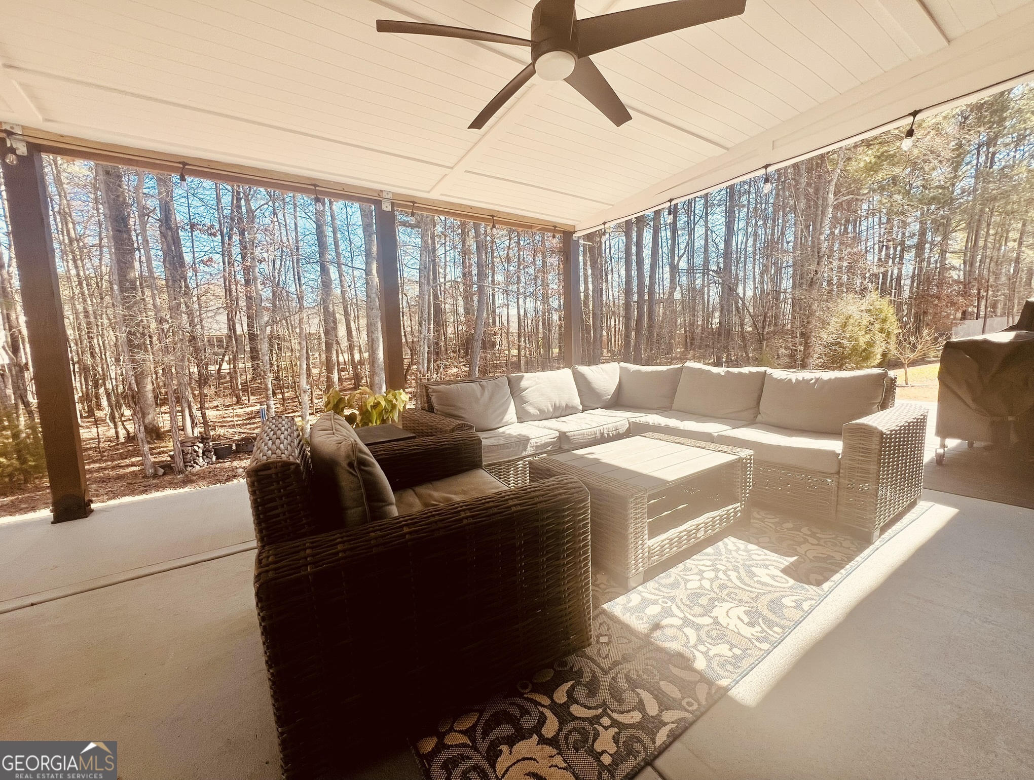 78 Willowrun Drive Rome, GA 30165 - Photo 32 of 35 a living room with furniture and a floor to ceiling window