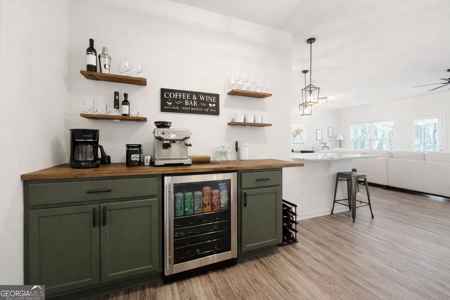 78 Willowrun Drive Rome, GA 30165 - Photo 6 of 35 a kitchen with sink cabinets and wooden floor