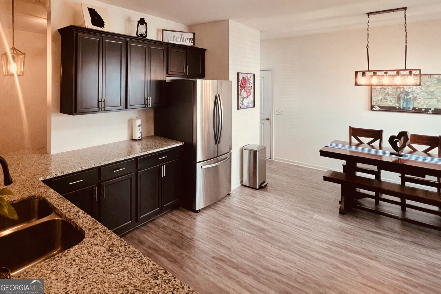 78 Willowrun Drive Rome, GA 30165 - Photo 7 of 35 a kitchen with stainless steel appliances kitchen island granite countertop a refrigerator and a sink
