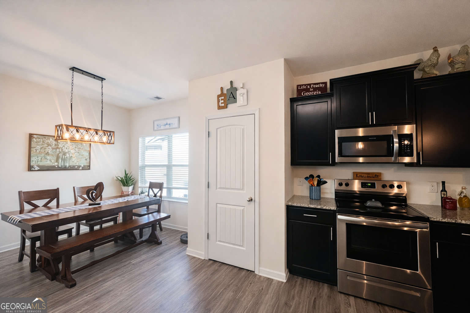 78 Willowrun Drive Rome, GA 30165 - Photo 8 of 35 a living room with furniture and a flat screen tv