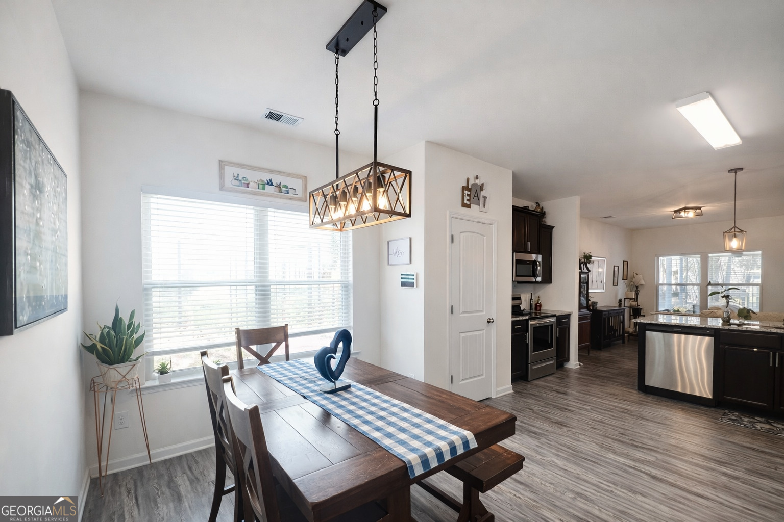 78 Willowrun Drive Rome, GA 30165 - Photo 9 of 35 a view of a dining room with furniture window and wooden floor