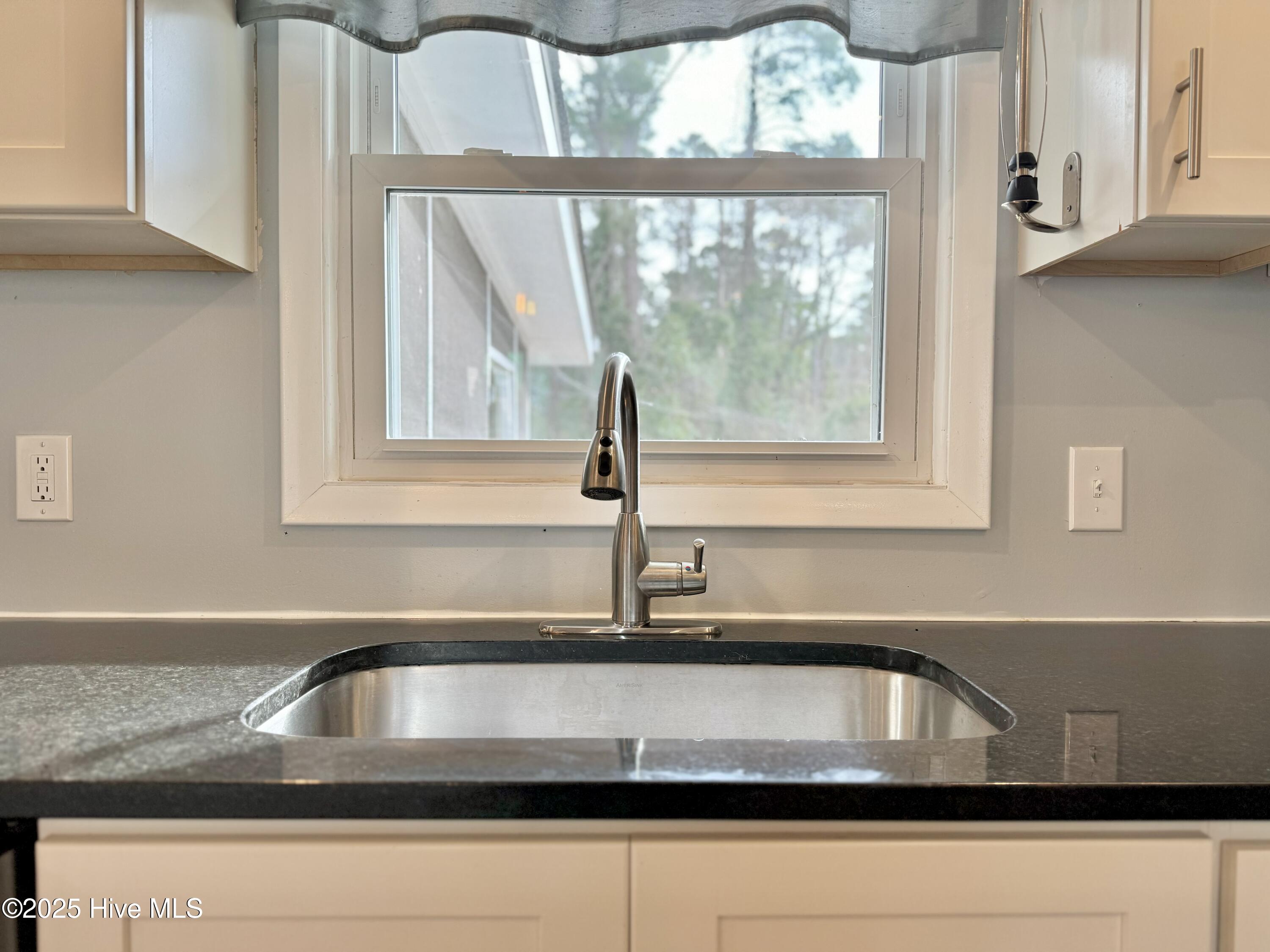 3929 Masonboro Loop Road Wilmington, NC 28409 - Photo 26 of 56 Kitchen Sink and Window