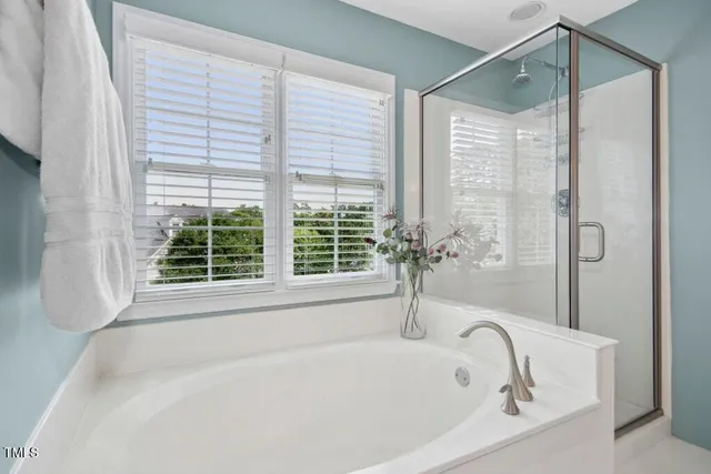 a view of a room with rack on the wall and a window