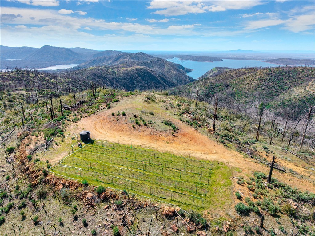 0 Big Ridge Road Berry Creek, CA 95916 - Photo 11 of 25 a view of a lake with mountains in the background