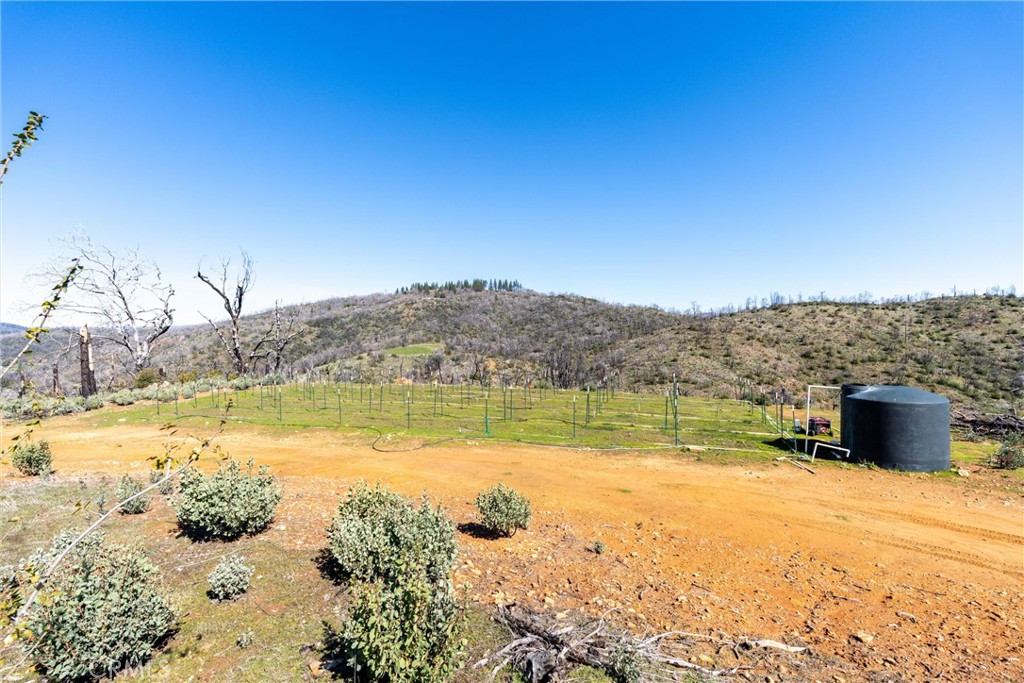 0 Big Ridge Road Berry Creek, CA 95916 - Photo 18 of 25 a view of a lake with a mountain