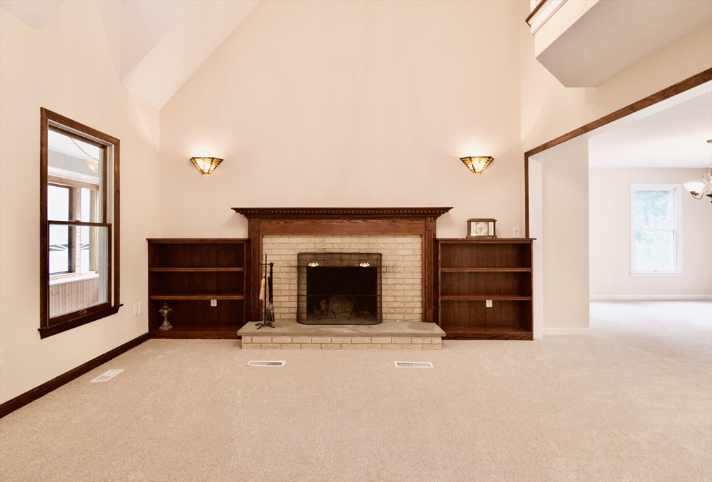97 Monson Road Brimfield, MA 01010 - Photo 14 of 42 a living room with furniture and a fireplace