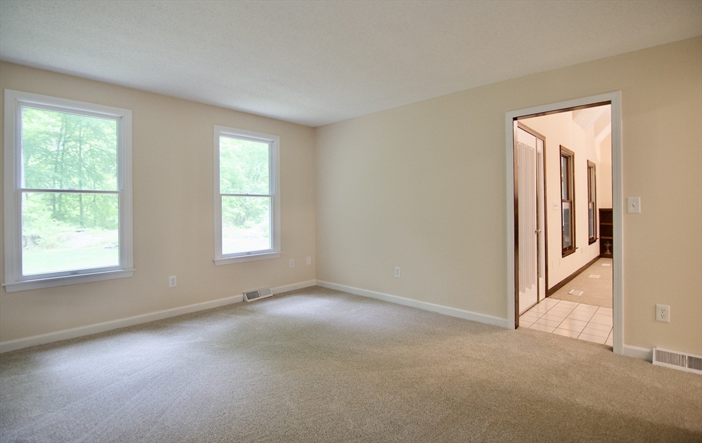 97 Monson Road Brimfield, MA 01010 - Photo 27 of 42 an empty room with windows and closet