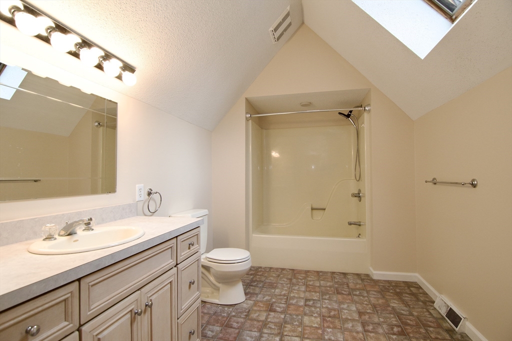 97 Monson Road Brimfield, MA 01010 - Photo 38 of 42 a bathroom with a sink a toilet and shower