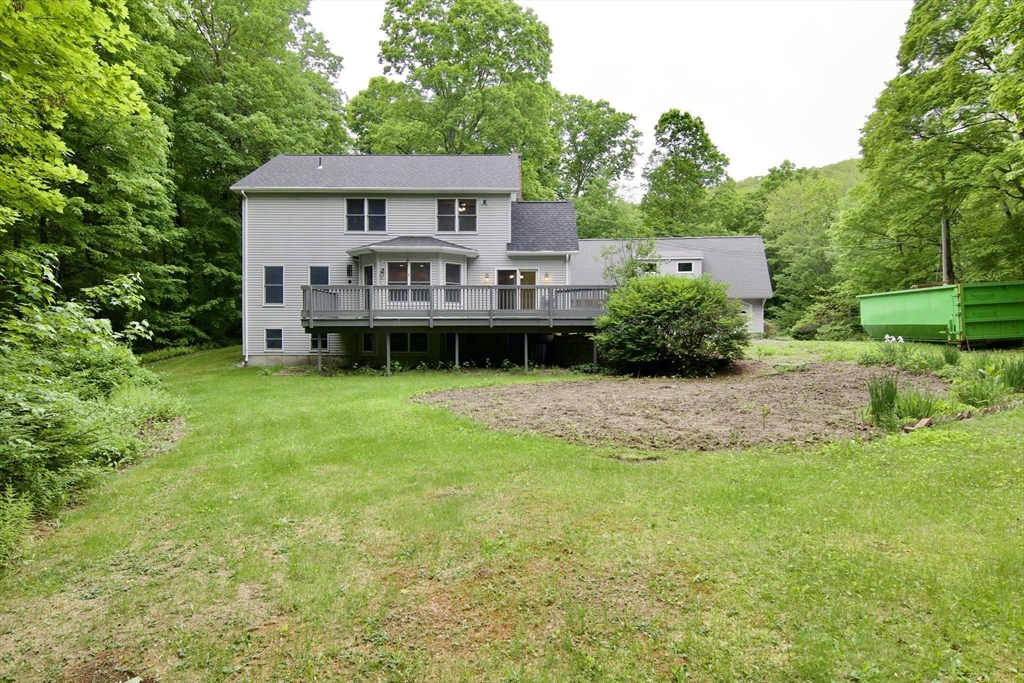 97 Monson Road Brimfield, MA 01010 - Photo 5 of 42 a view of a house with a yard balcony and sitting area