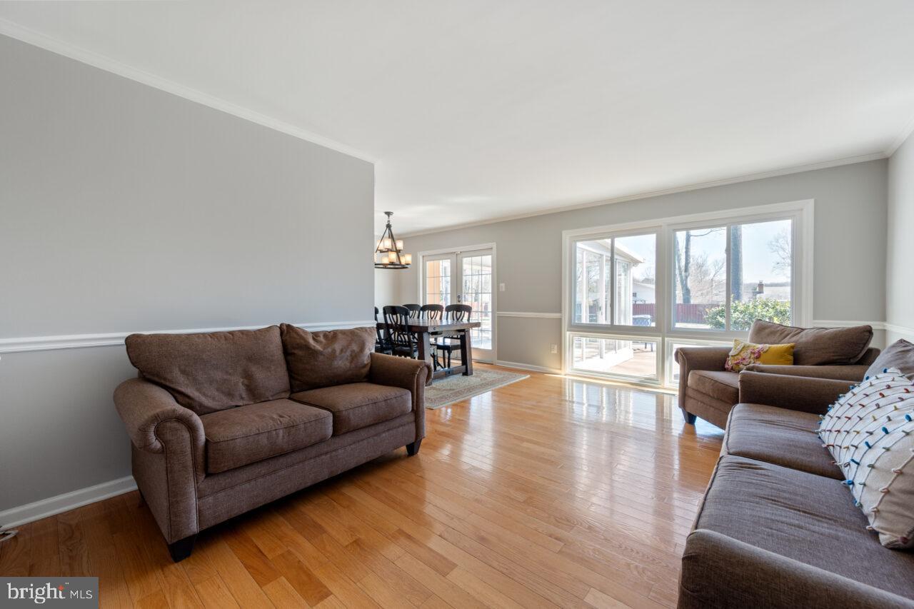 2405 Cedar Lane Vienna, VA 22180 - Photo 12 of 56 a living room with furniture and a large window