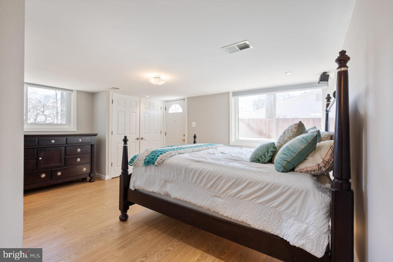 2405 Cedar Lane Vienna, VA 22180 - Photo 15 of 56 a bedroom with a bed and a closet