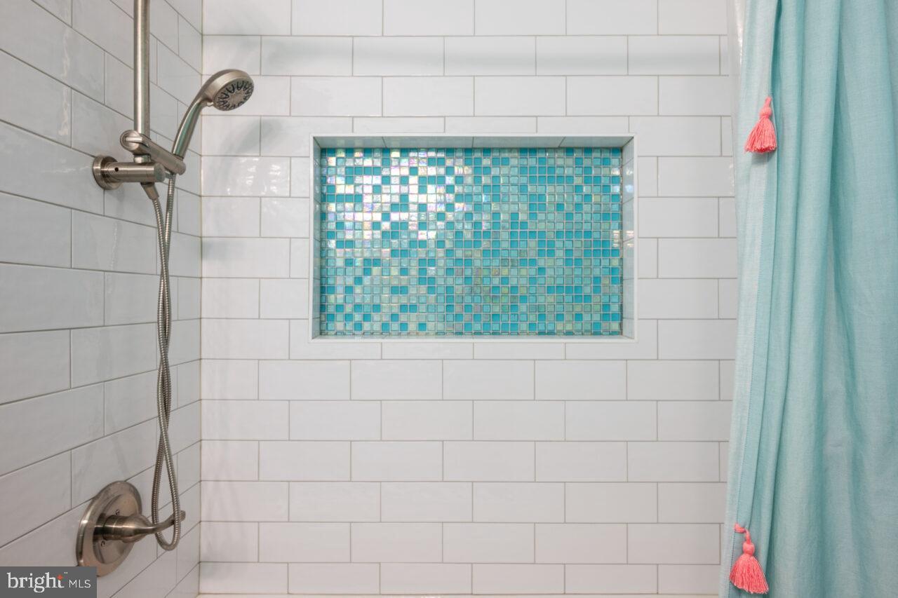 2405 Cedar Lane Vienna, VA 22180 - Photo 23 of 56 a bathroom with a shower