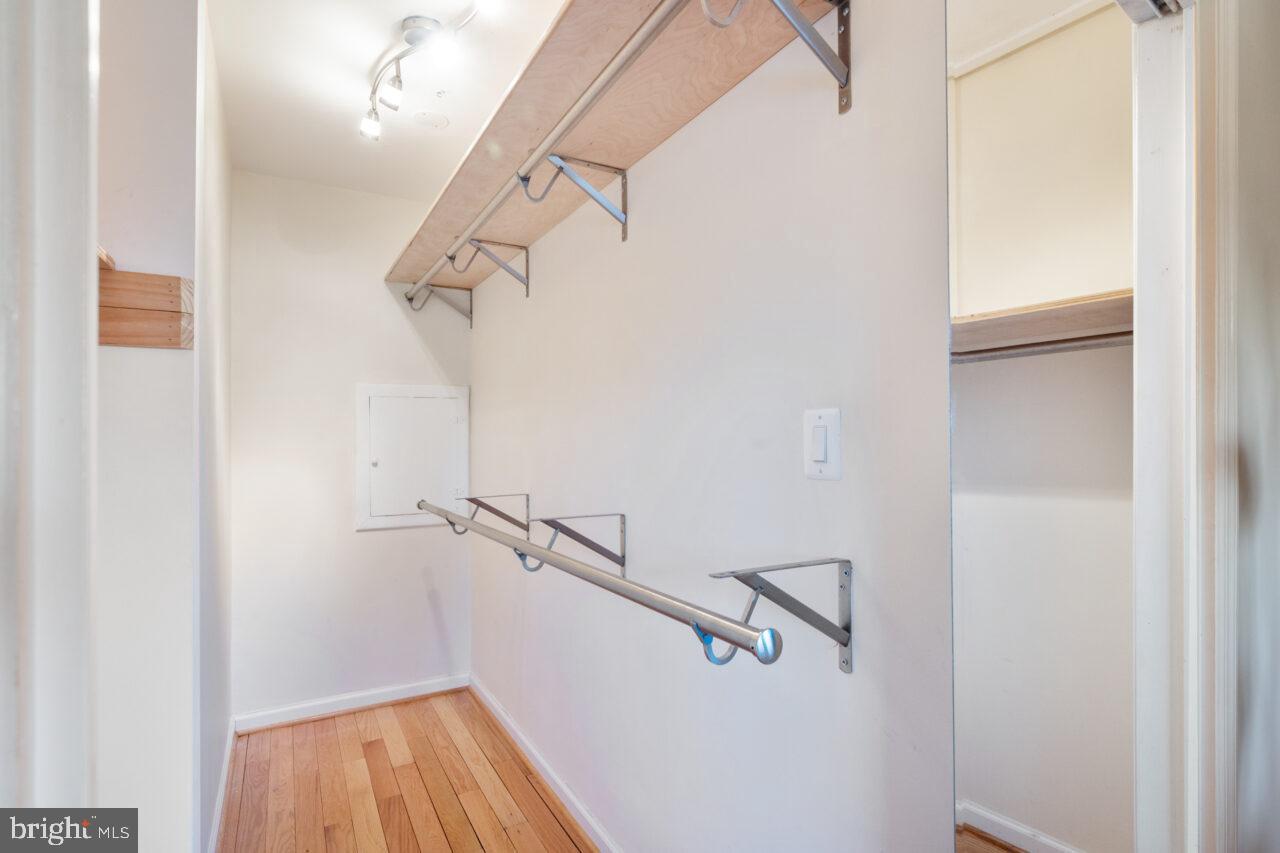 2405 Cedar Lane Vienna, VA 22180 - Photo 28 of 56 a view of closet with wooden floor