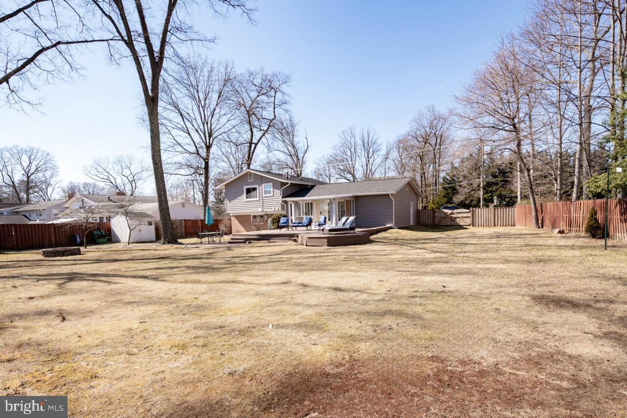 2405 Cedar Lane Vienna, VA 22180 - Photo 4 of 56 a view of a town with snow on the road
